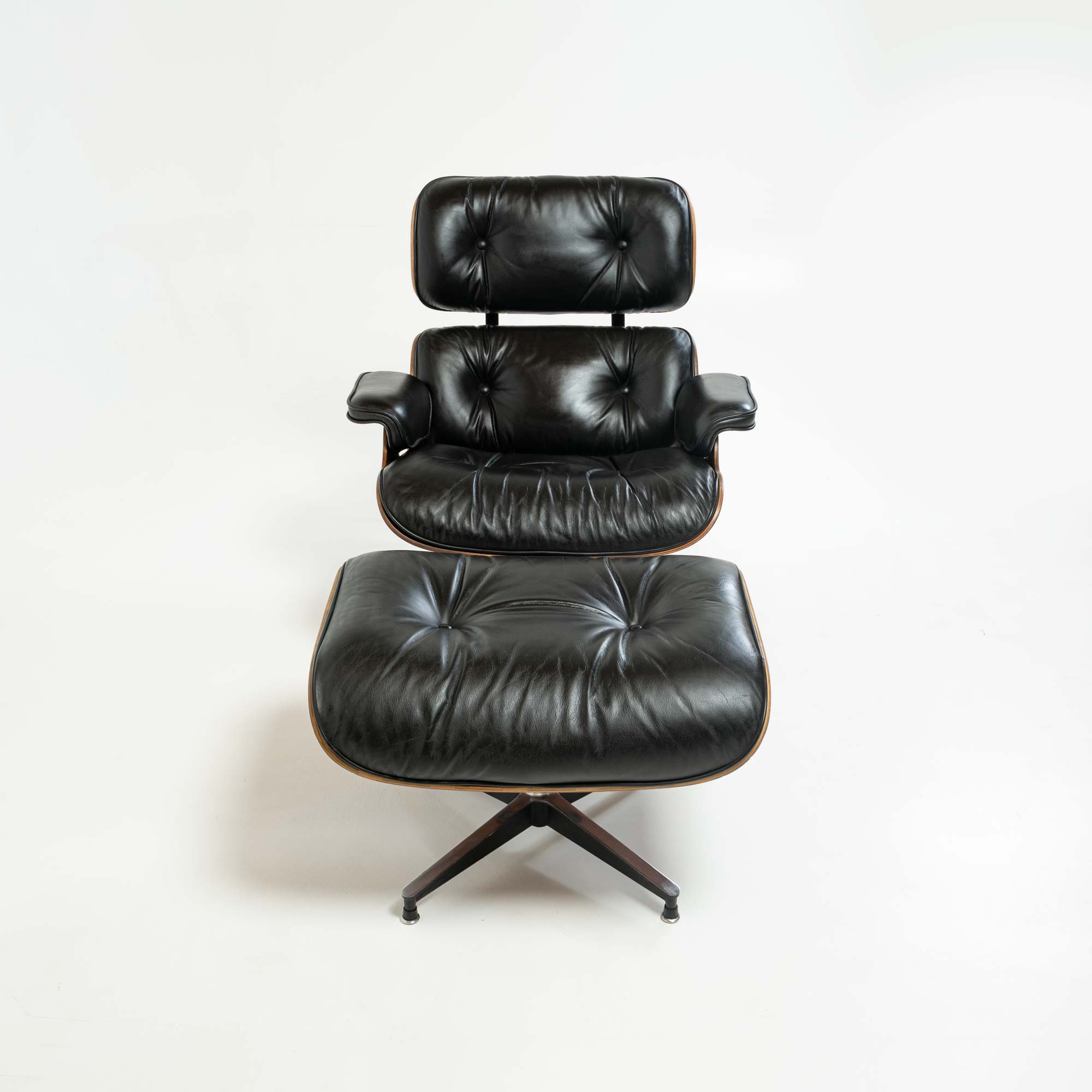 First Generation 1956 Eames Lounge Chair 670 and Bootglide Ottoman 671