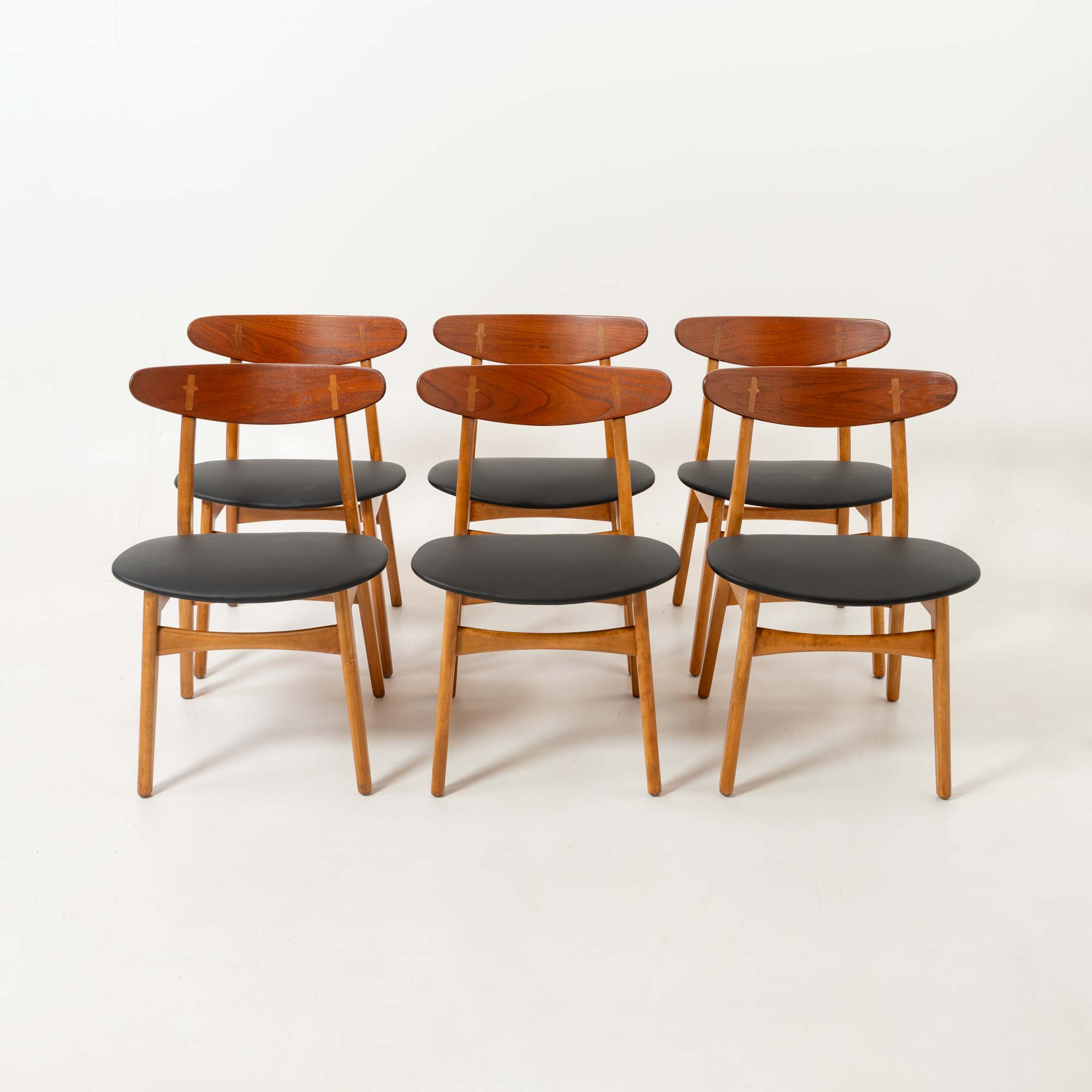 Set of six Hans Wegner for Carl Hansen & Son CH-30 Chairs in Teak and Black Leather