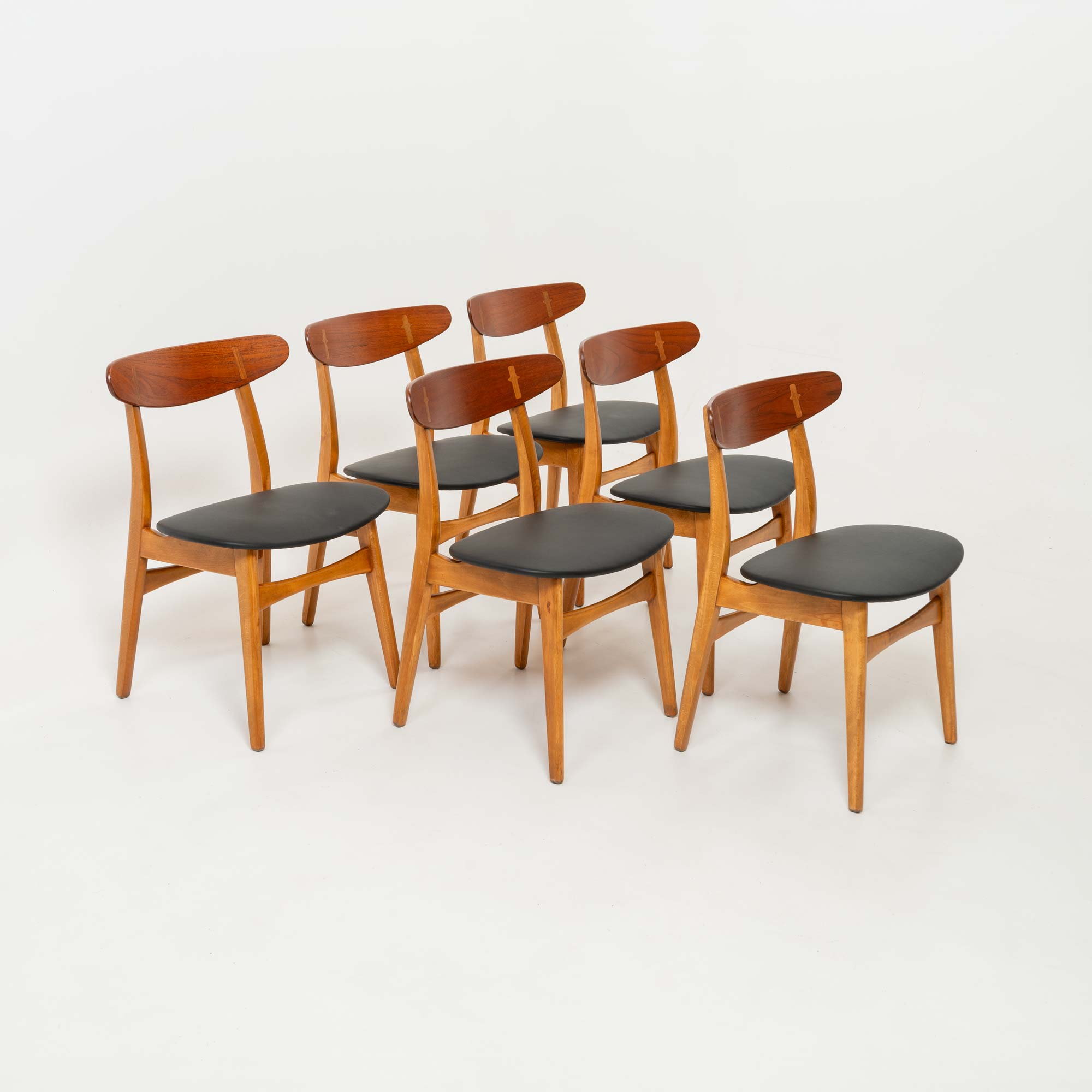 Set of six Hans Wegner for Carl Hansen & Son CH-30 Chairs in Teak and Black Leather