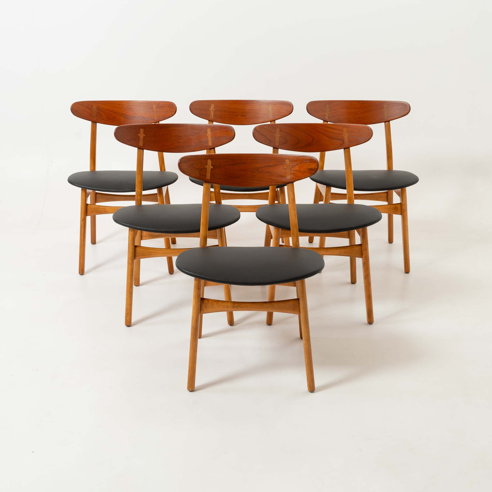 Set of six Hans Wegner for Carl Hansen & Son CH-30 Chairs in Teak and Black Leather