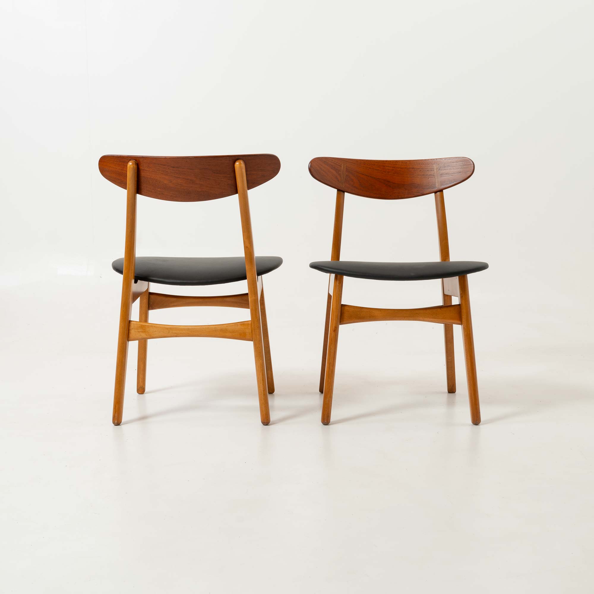 Set of six Hans Wegner for Carl Hansen & Son CH-30 Chairs in Teak and Black Leather