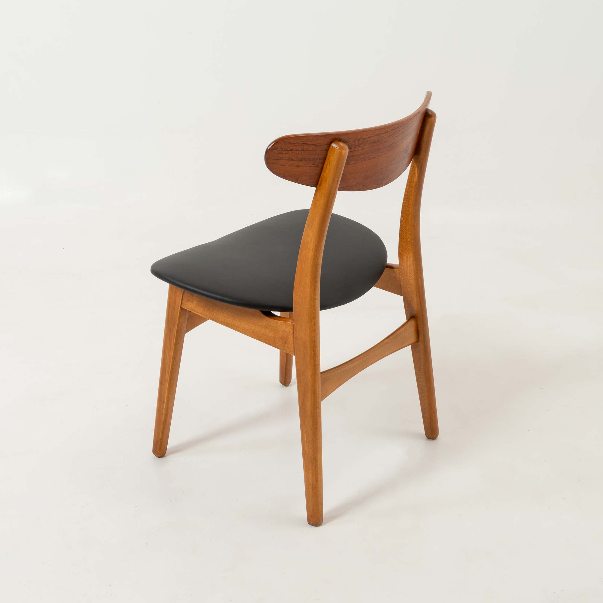 Set of six Hans Wegner for Carl Hansen & Son CH-30 Chairs in Teak and Black Leather