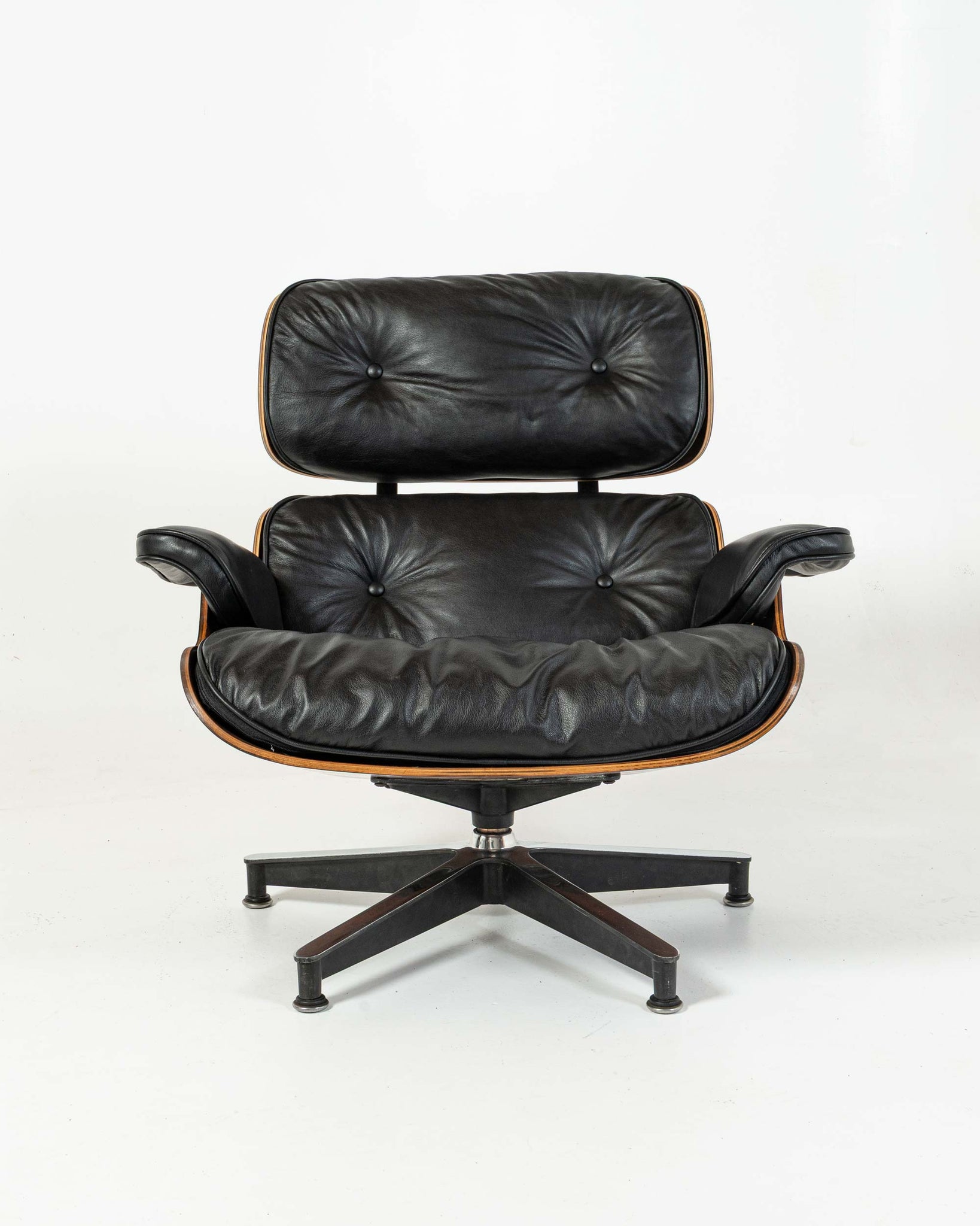 Exceptional Grain First Generation 1956 Eames Lounge Chair 670 and Bootglide Ottoman 671