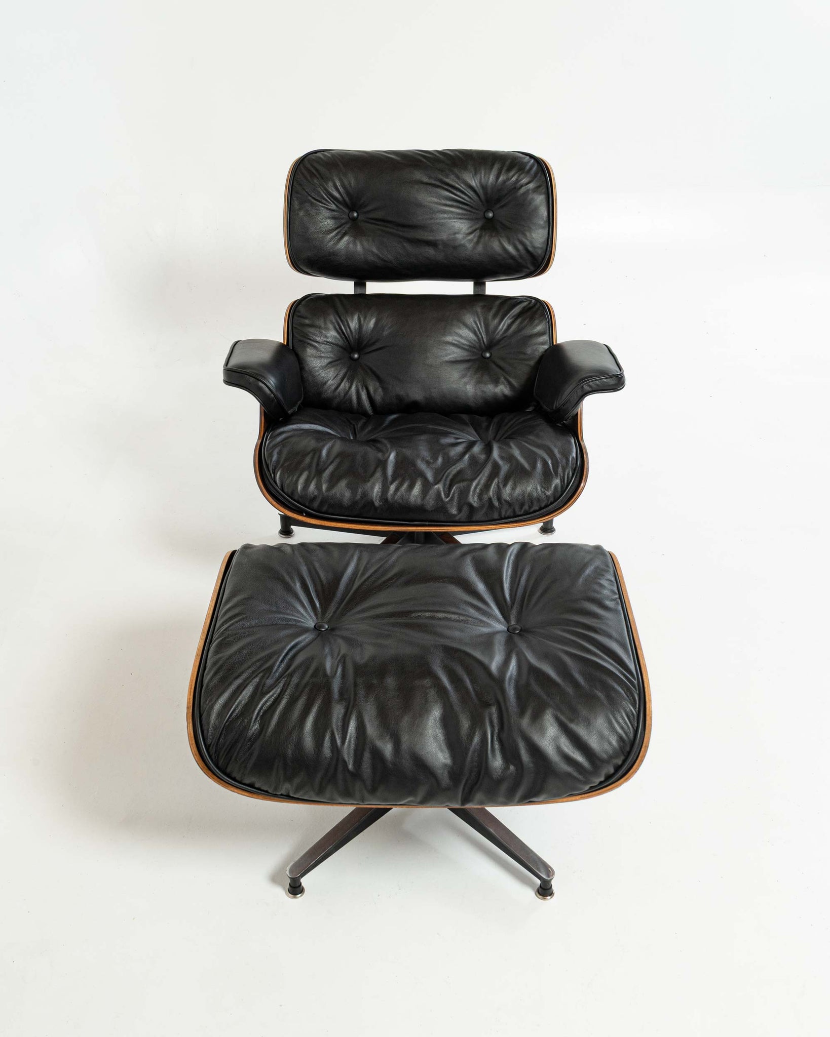 Exceptional Grain First Generation 1956 Eames Lounge Chair 670 and Bootglide Ottoman 671
