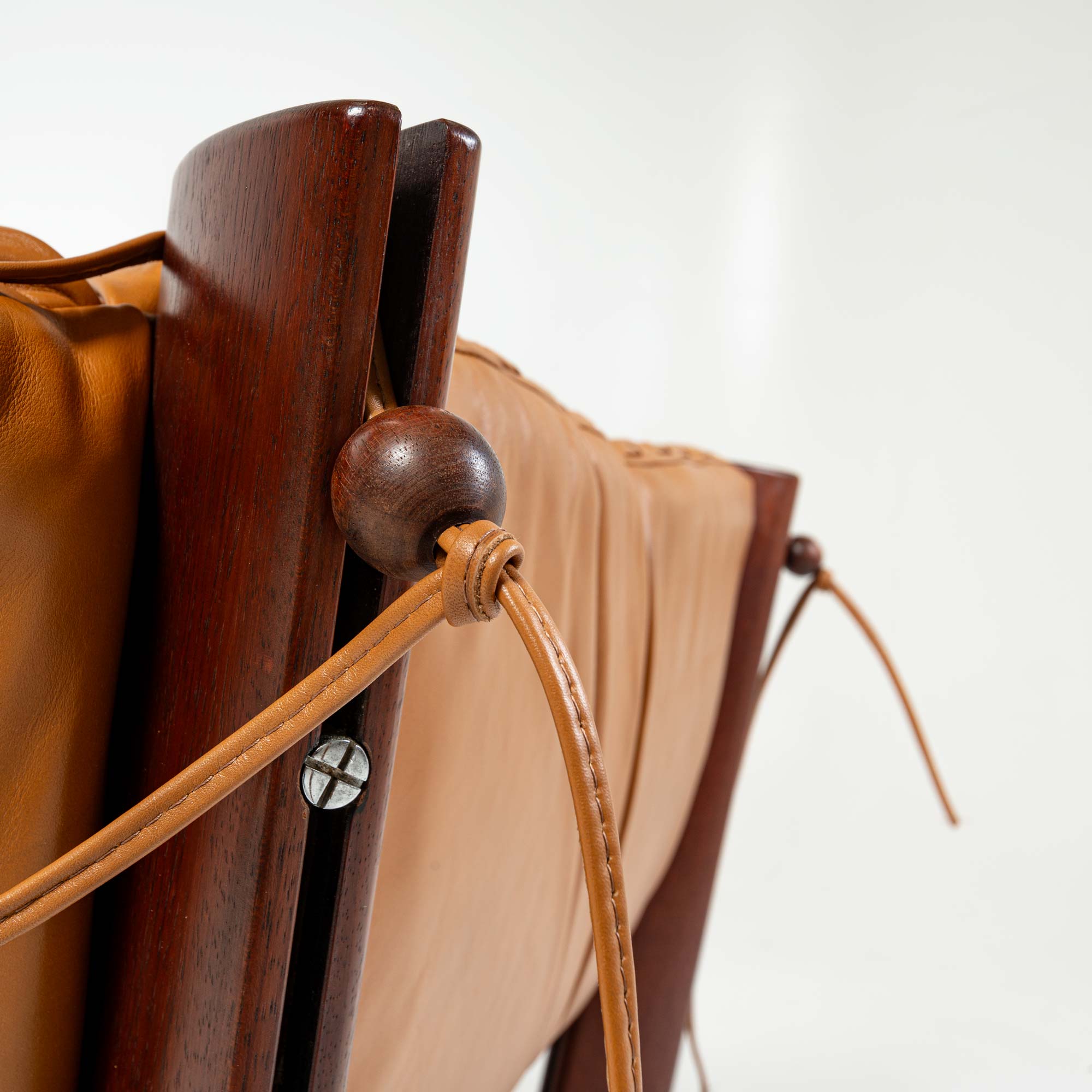 Percival Lafer MP-211 lounge chair in rosewood and Maharam Sorghum