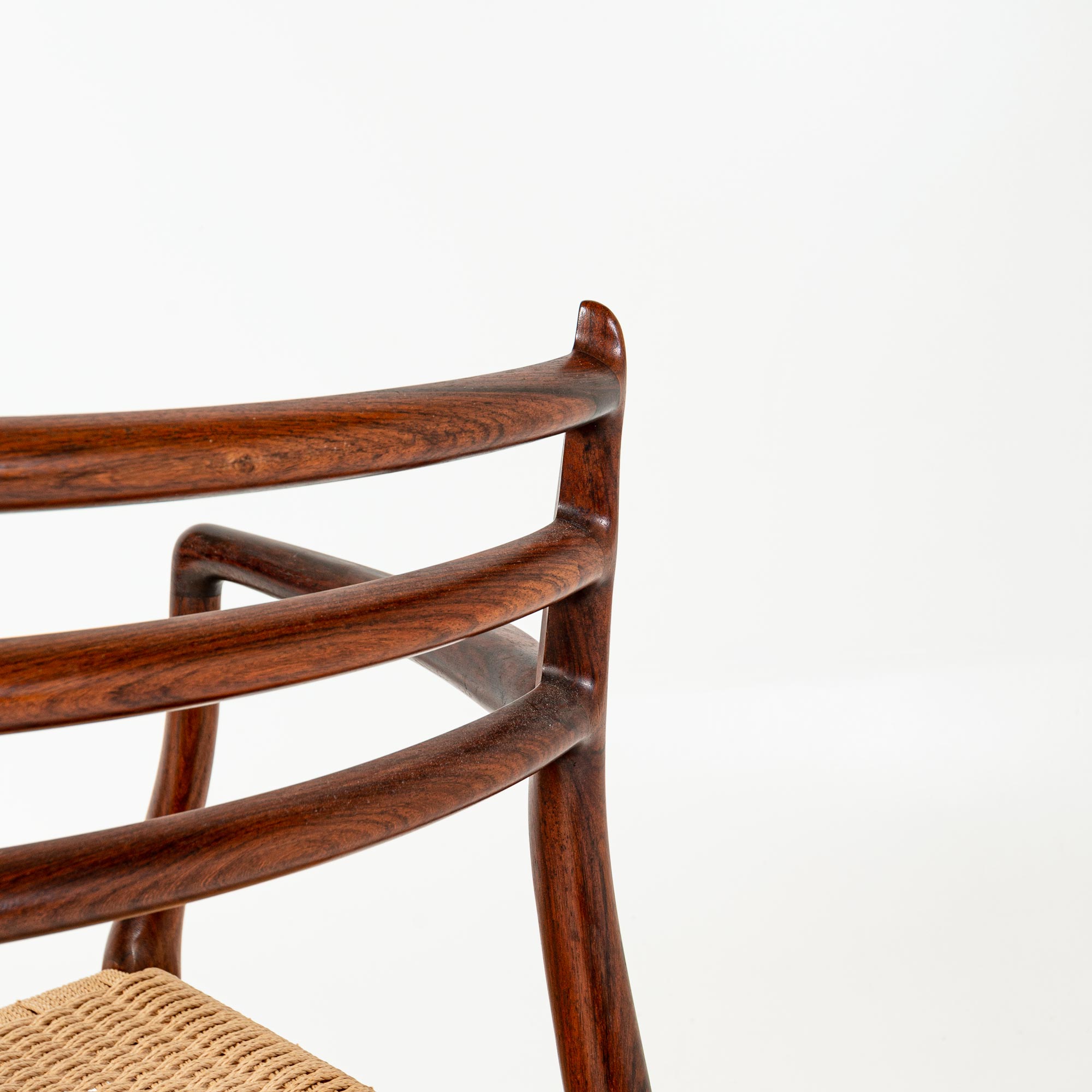 Single Møller 62 arm chair in Rosewood and Papercord