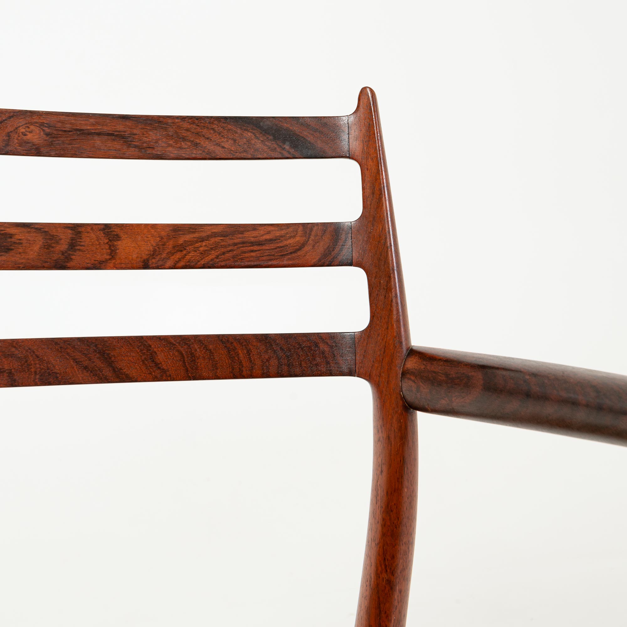 Single Møller 62 arm chair in Rosewood and Papercord