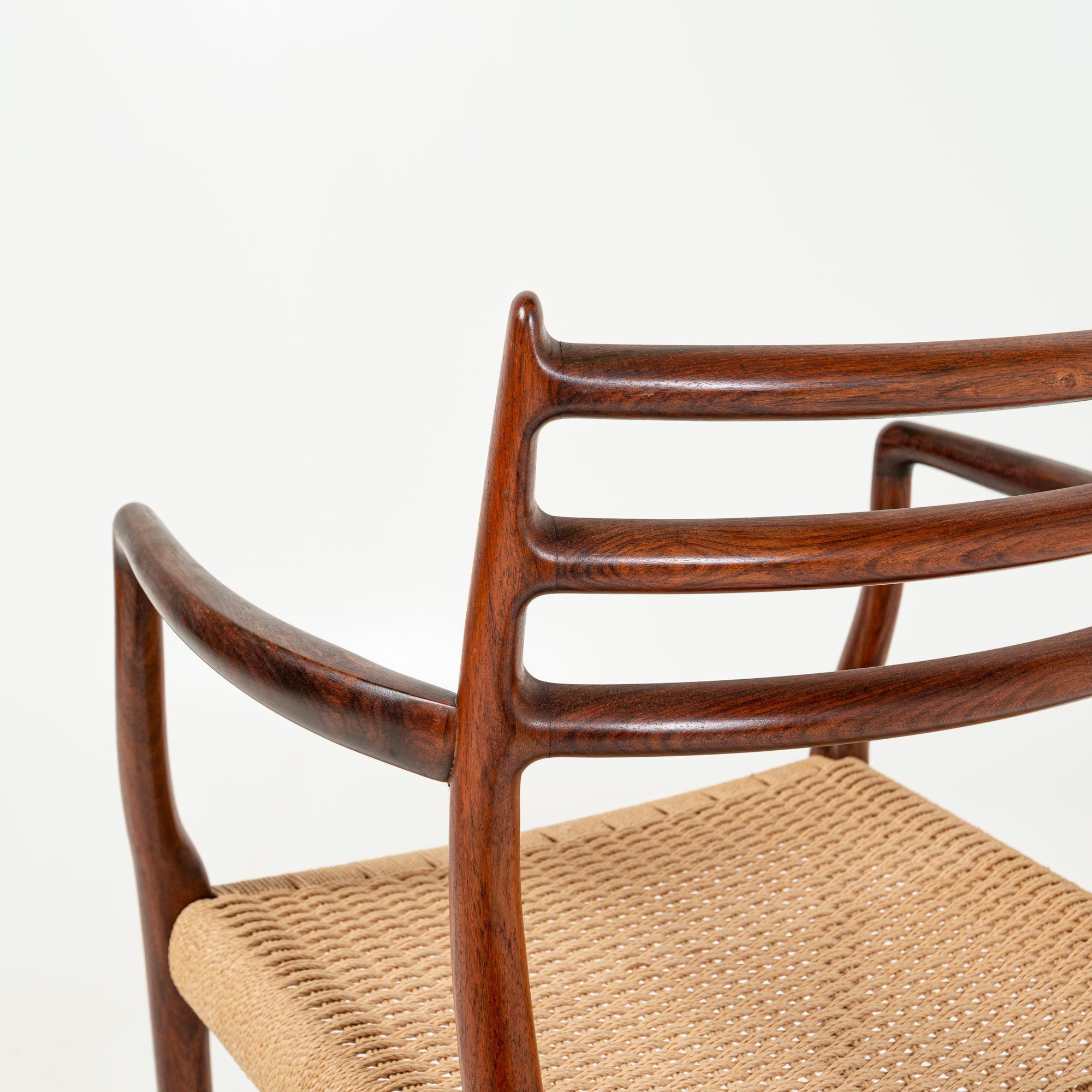 Single Møller 62 arm chair in Rosewood and Papercord