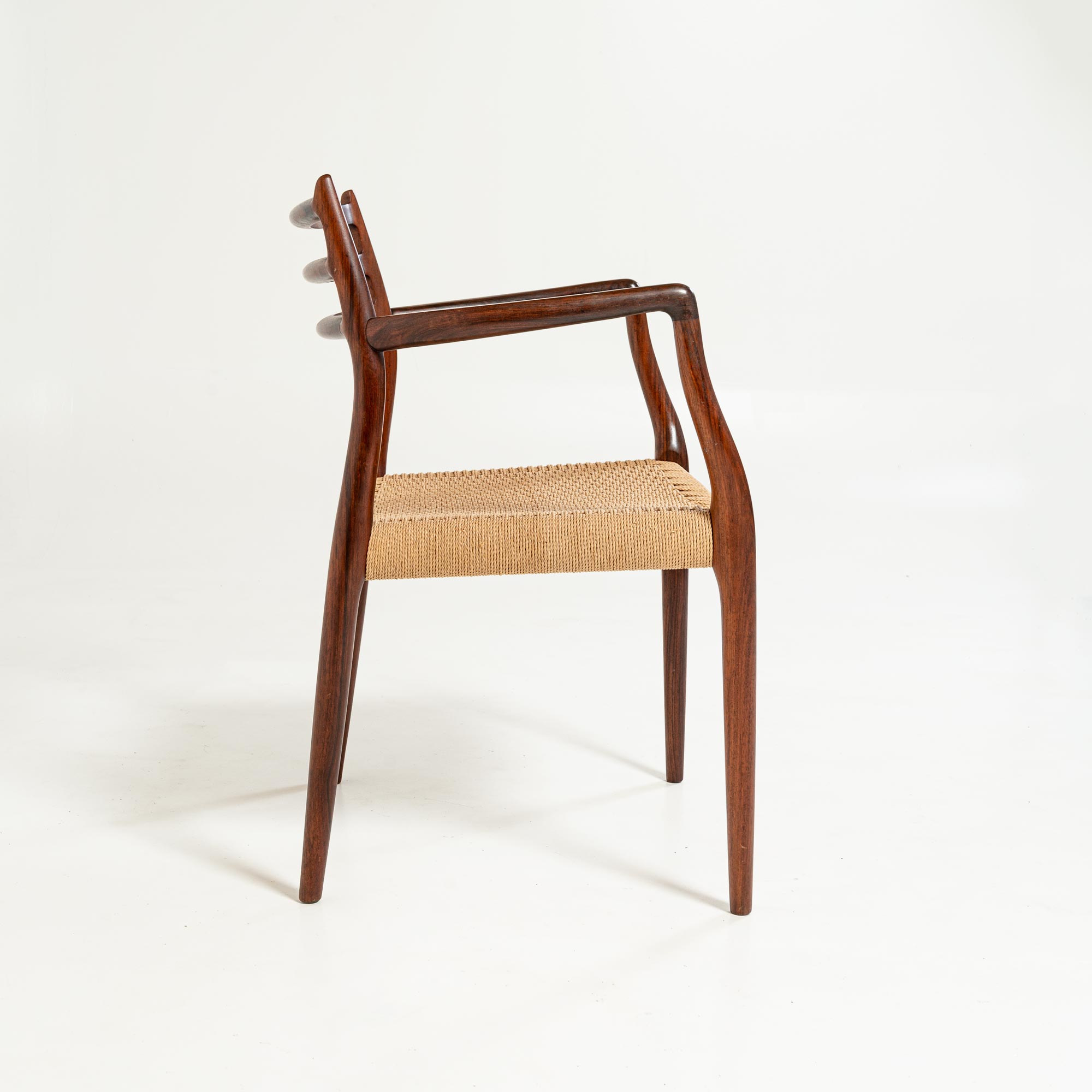 Single Møller 62 arm chair in Rosewood and Papercord