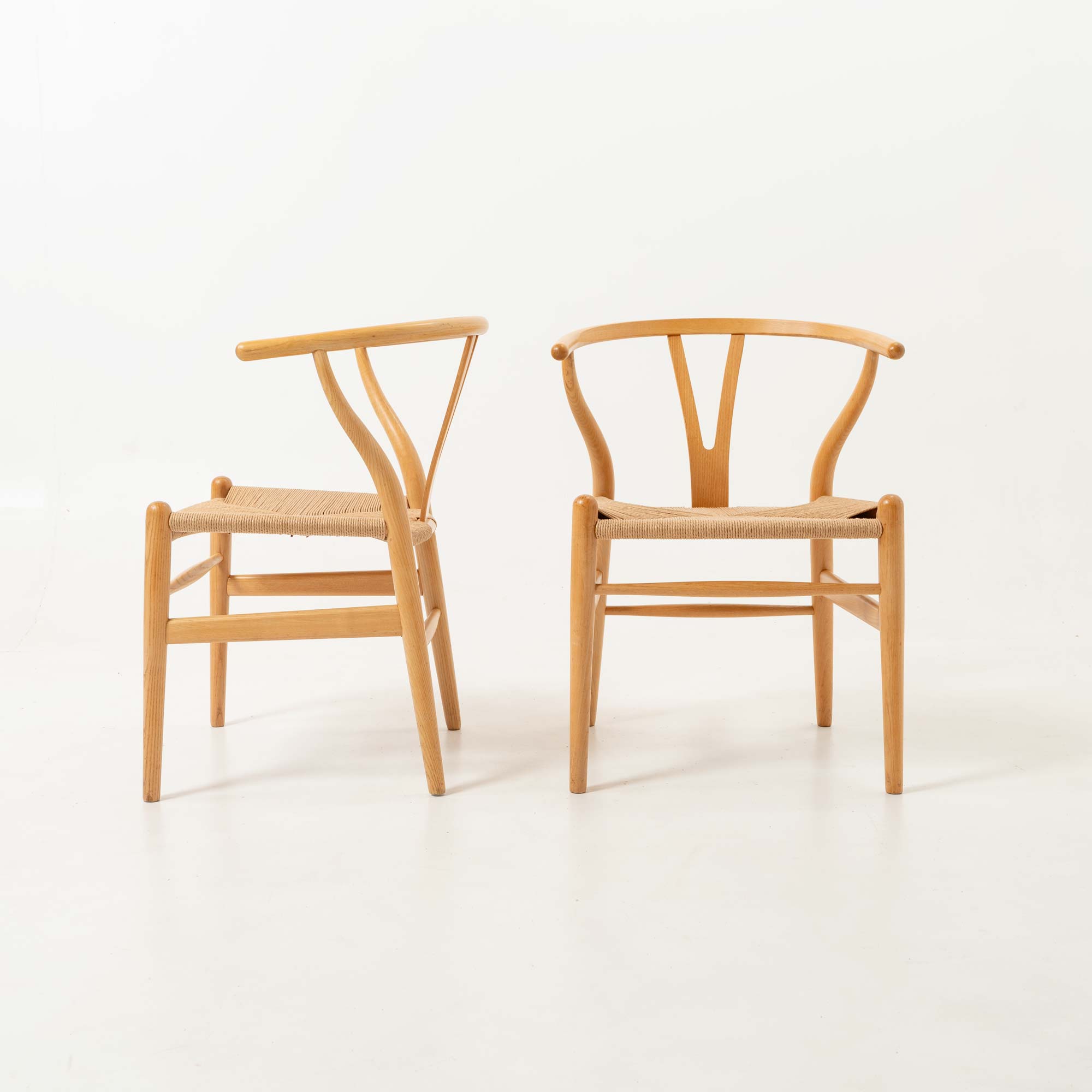 Set of six Hans Wegner for Carl Hansen & Son CH-24  Wishbone Chairs in Oak and Papercord