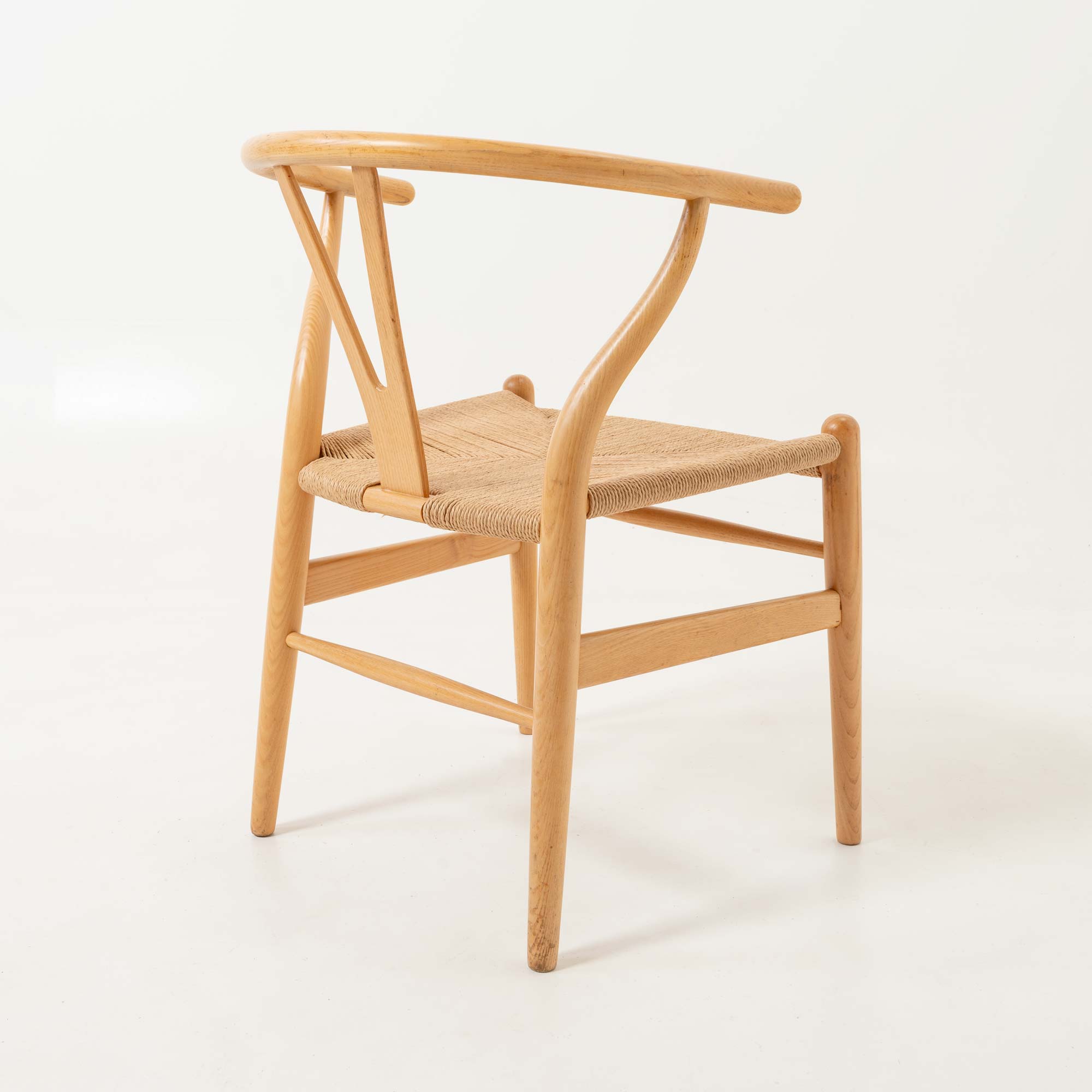 Set of six Hans Wegner for Carl Hansen & Son CH-24  Wishbone Chairs in Oak and Papercord